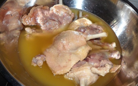 Duck Leg bathing in duck fat.